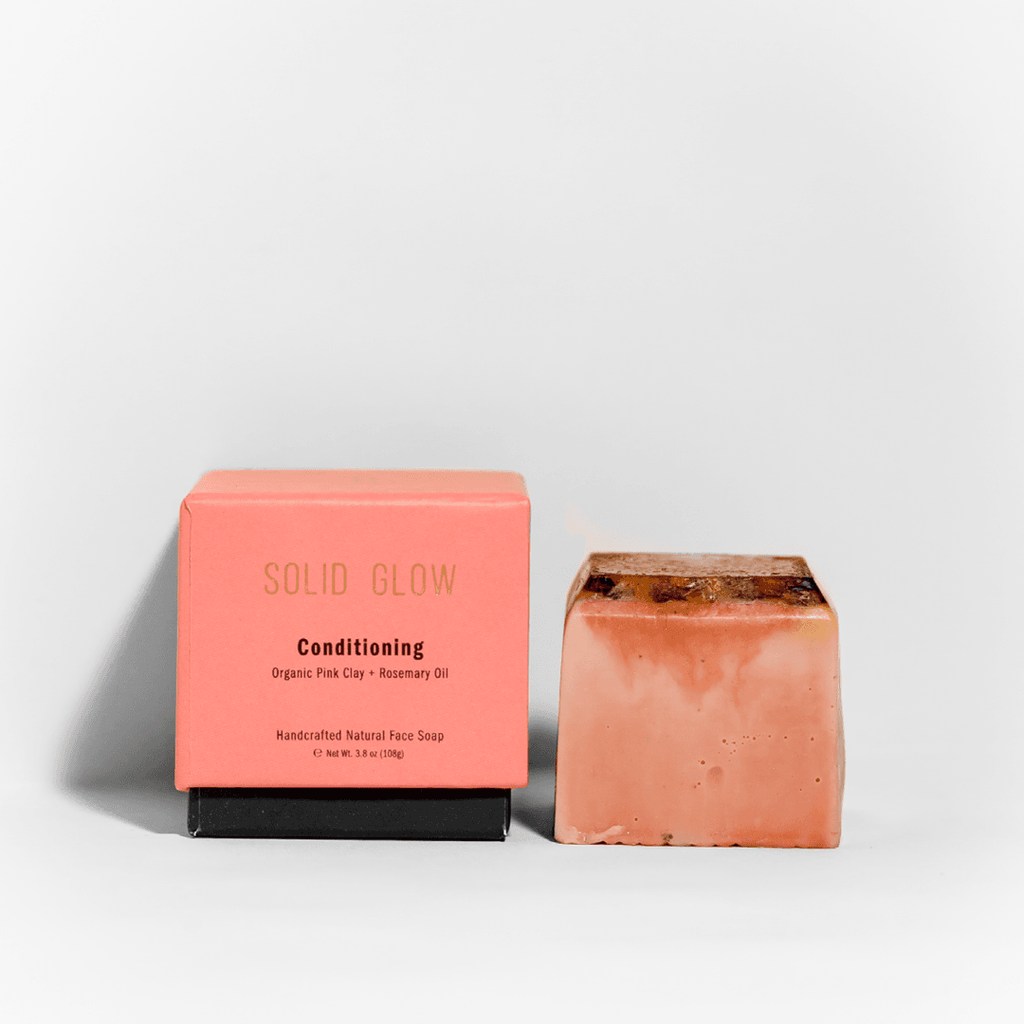 Solid Glow - Conditioning Natural Face Soap (Pink Clay + Rosemary) | SWAY's Solid Glow are handcrafted facial soaps that look and smell as delicious as desserts. Enriched with organic pink clay and rosemary oil, this conditioning facial bar is designed to gently draw out impurities without drying your face. It moisturizes and polishes dehydrated skin, leaving you with a silky smooth texture and refreshing scent. 