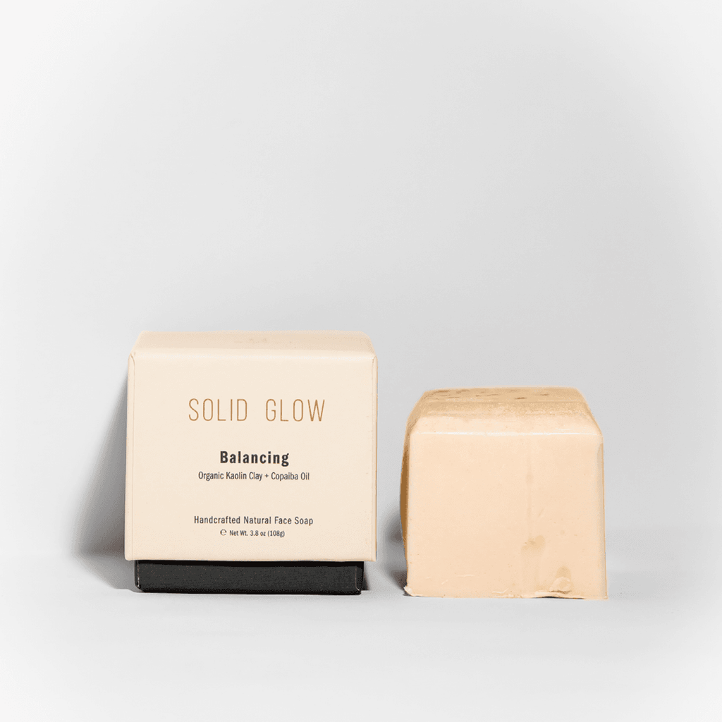 Solid Glow - Balancing Natural Face Soap (Kaolin Clay + Copaiba Oil) | (3.8 oz. / 108g) SWAY's Solid Glow are handcrafted facial soaps that look and smell as delicious as desserts. While kaolin clay has both the hydration and oil reduction properties anyone would enjoy, copaiba oil is anti-inflammatory and healing, capable of soothing irritated skin and chronic skin disorders.